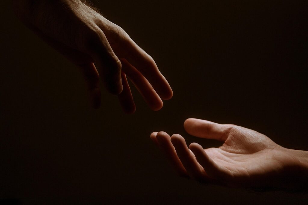 Emotional Triggers in Relationships: Why Your Partner Gets Under Your Skin
Close-up of couple’s hands almost touching, symbolizing vulnerability and emotional connection